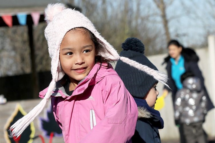 a young girl in a playground