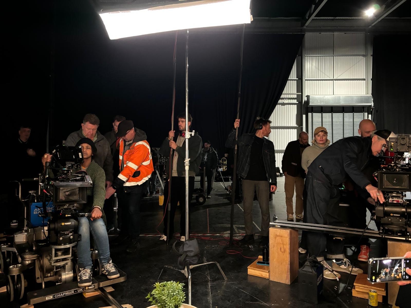 Film crew working live on set of production