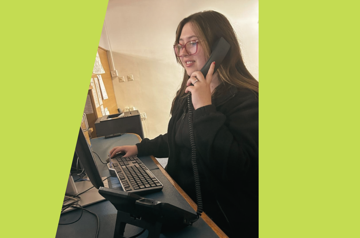 Picture of female receptionist using the telephone
